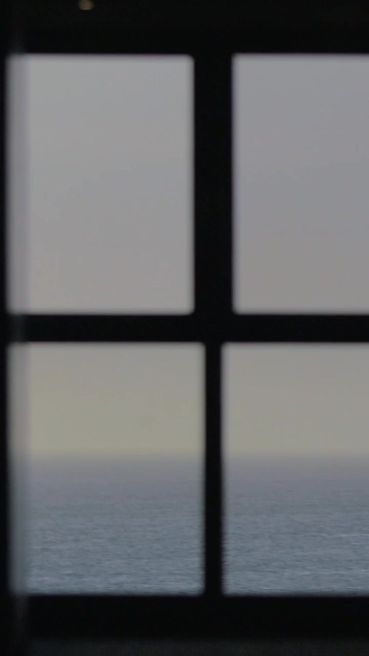 Quiet sea and skyline, view from house window