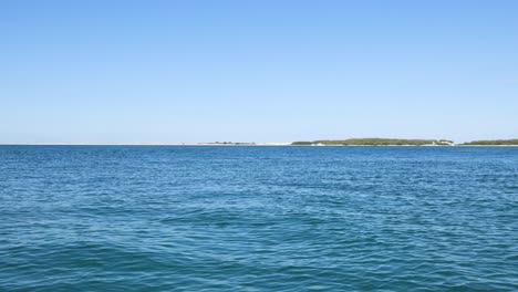 tranquil ocean view with distant islands