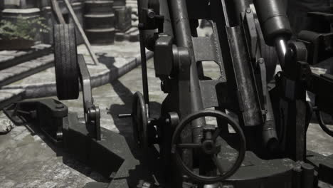 detailed view of an artillery piece in a historic military setting