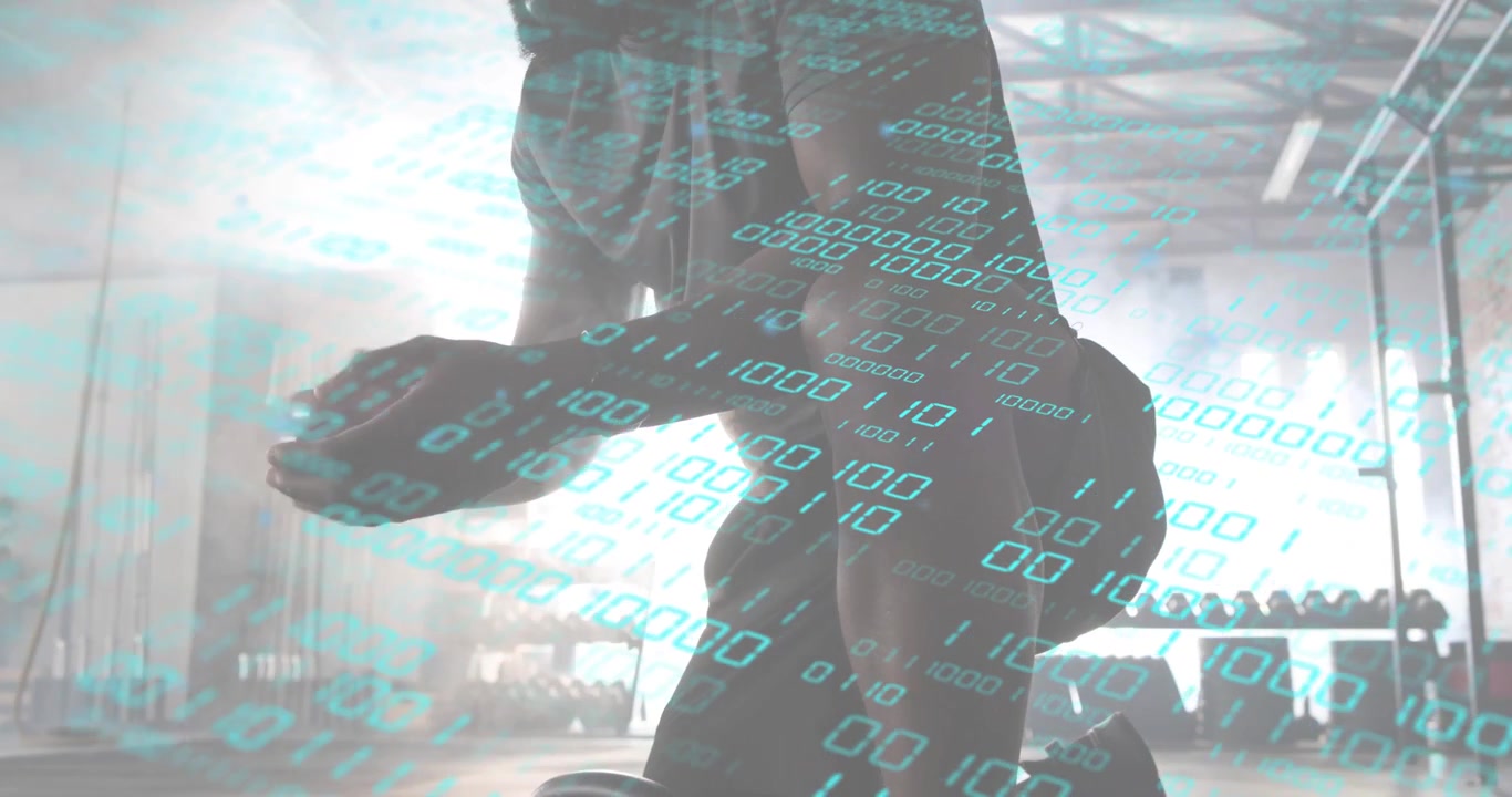 Woman kneeling in gym chalking palms before gripping kettlebell preparing lift with binary overlay