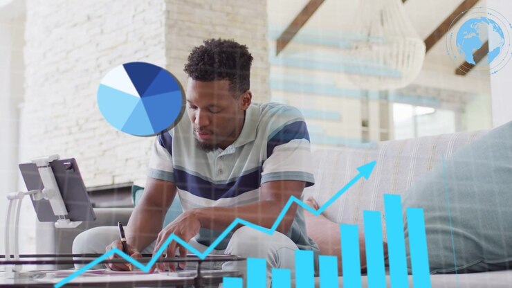 Man leaning looking at tablet writing on glass table for analytics with animated charts appearing