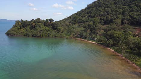 Golden-sand,-emerald-green-water