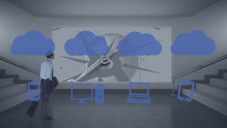 animación de nube con iconos sobre hombre de negocios caucásico en la oficina