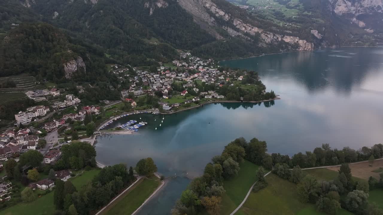 Village Of Weesen And Walensee Lake In The Canton Of St. Gallen, Switzerland. Aerial Drone Shot