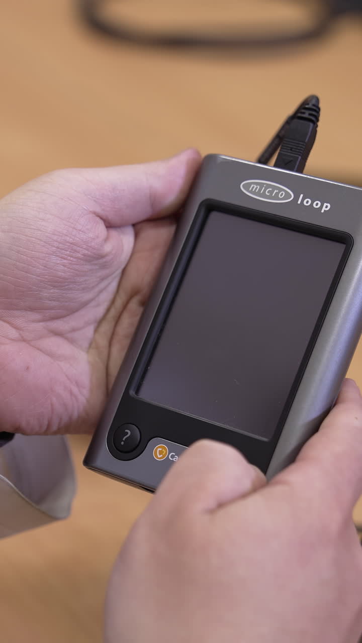 Doctor hands using equipment. Close up view of doctor using medical equipment. Vertical video