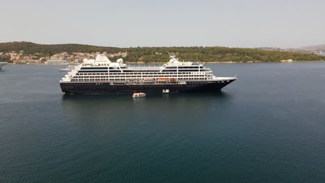 harmful cruise ships in greek landscape, concept nature pollution, aerial orbit