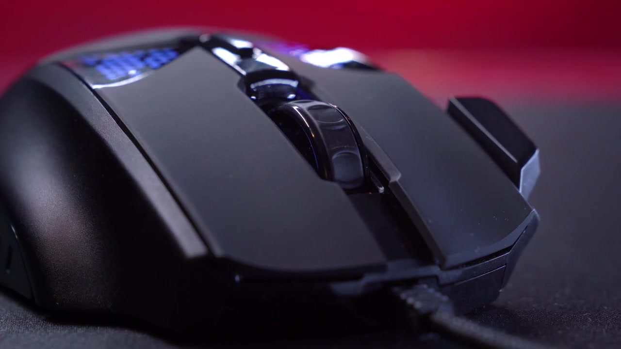 Close Up of a Gaming Mouse with Changing RGB Lighting