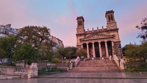 facade of saint-vincent-de-paul church, paris, france, panning