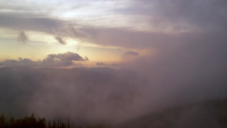 aerial push over treetops at sunset blue ridge mountains and appalachian mountains