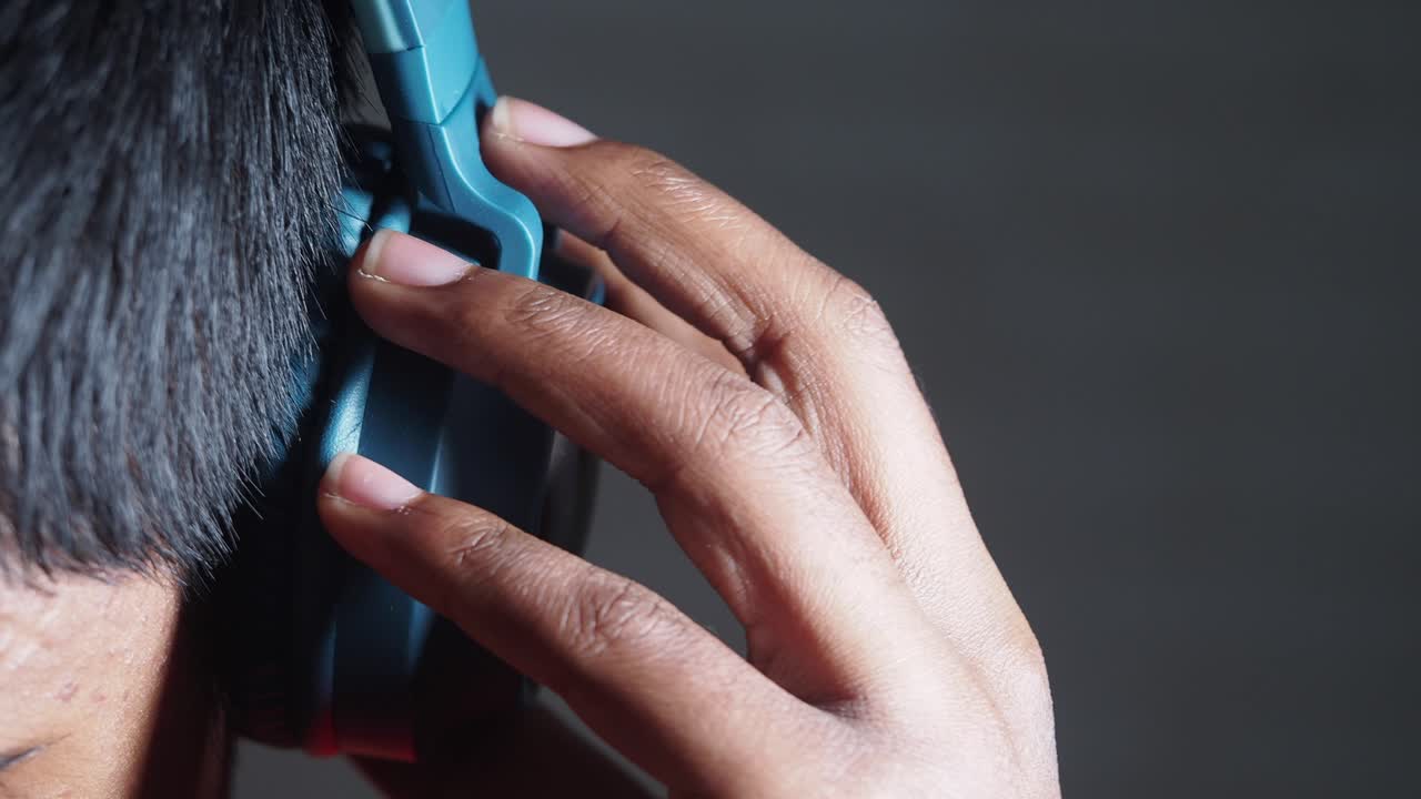 Person Wearing Headphones