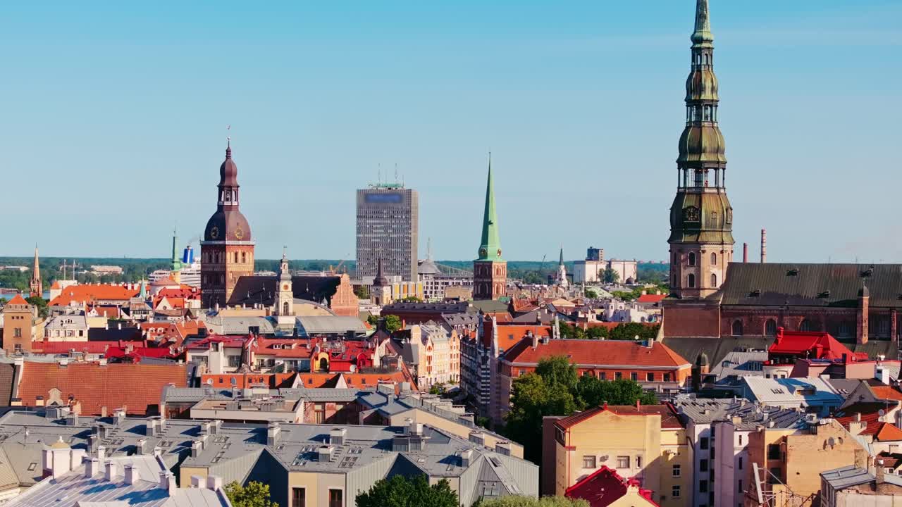 Cinematic sideways drone view of Riga old town with medieval and modern skyline