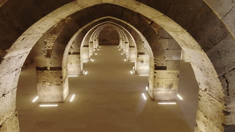 interior of historical monumental building with stone arches and domes