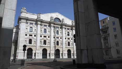 europe, italy, milan march 2020 - completely deserted places of tourist interest, without people, for n-cov19 coronavirus pandemic - borsa piazza affari , headquartered of italian money exchange