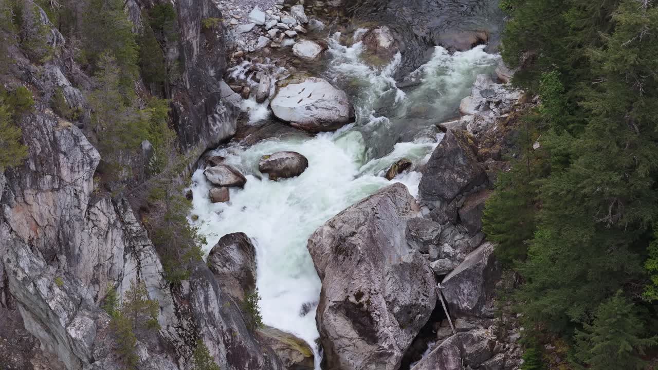 Aerial View of Powerful River Rapids in a Scenic Rocky Gorge, British Columbia.