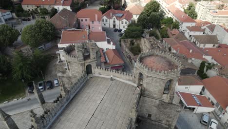 Above-view-of-merlon-parapet-in-medieval-battlement-architecture-fortification,-Guarda-church-in-Portugal