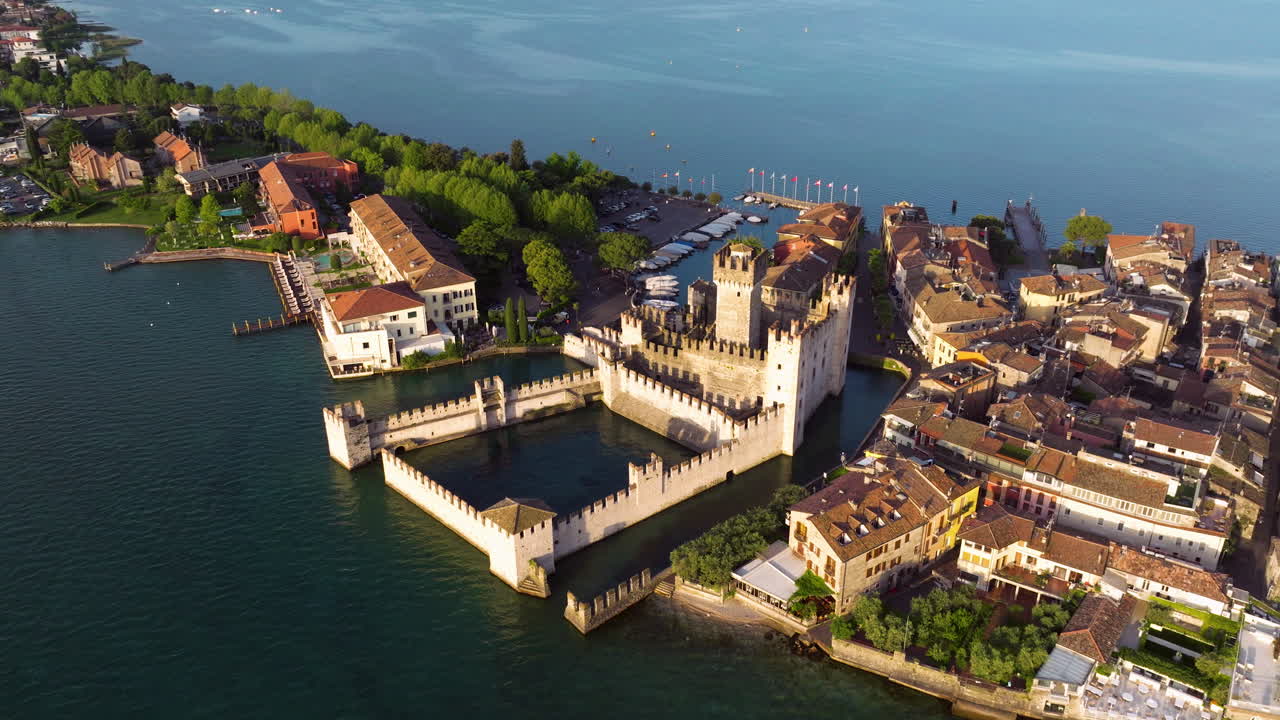 Aerial View Of Scaligero Castle Fortress During Sunrise In Sirmione On Lake Garda, Italy.