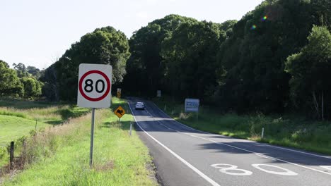 vehicle travels past 80 km/h speed sign