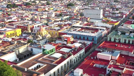 Aerial-View,-Oaxaca-City-Historic-Downtown,-Mexico,-Historic-Colonial-Buildings-and-Scenic-Cityscape,-Drone-Shot