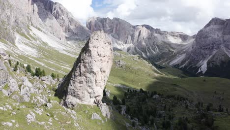 dolomite mountains with two pieralongia rocky peaks, aerial close up orbit