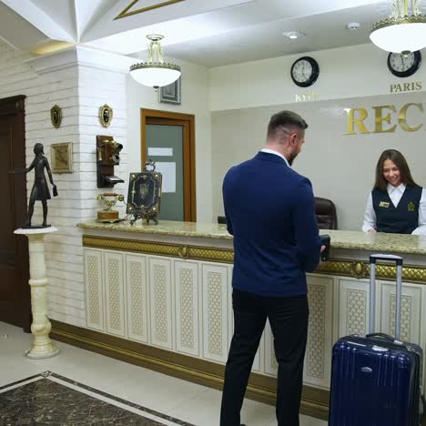 businessman at hotel reception