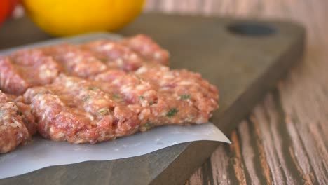 raw ground beef patties ready for cooking