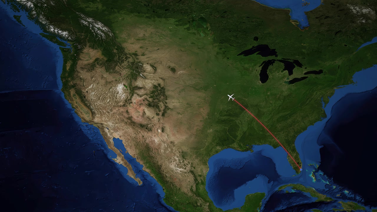 A red line tracks an airplane flying from Miami to Vancouver across a satellite map