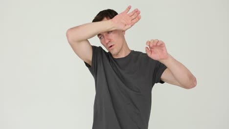 man feeling tired, dizzy, and unwell