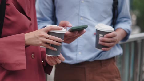 business people having coffee and using phones