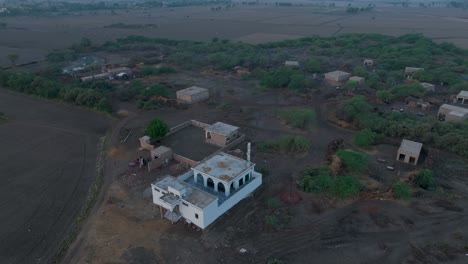 twilight over rural sindh village, pakistan - aerial