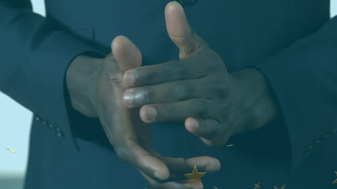 Clapping hands sending gold star confetti swirling around hands for flat design festive animation