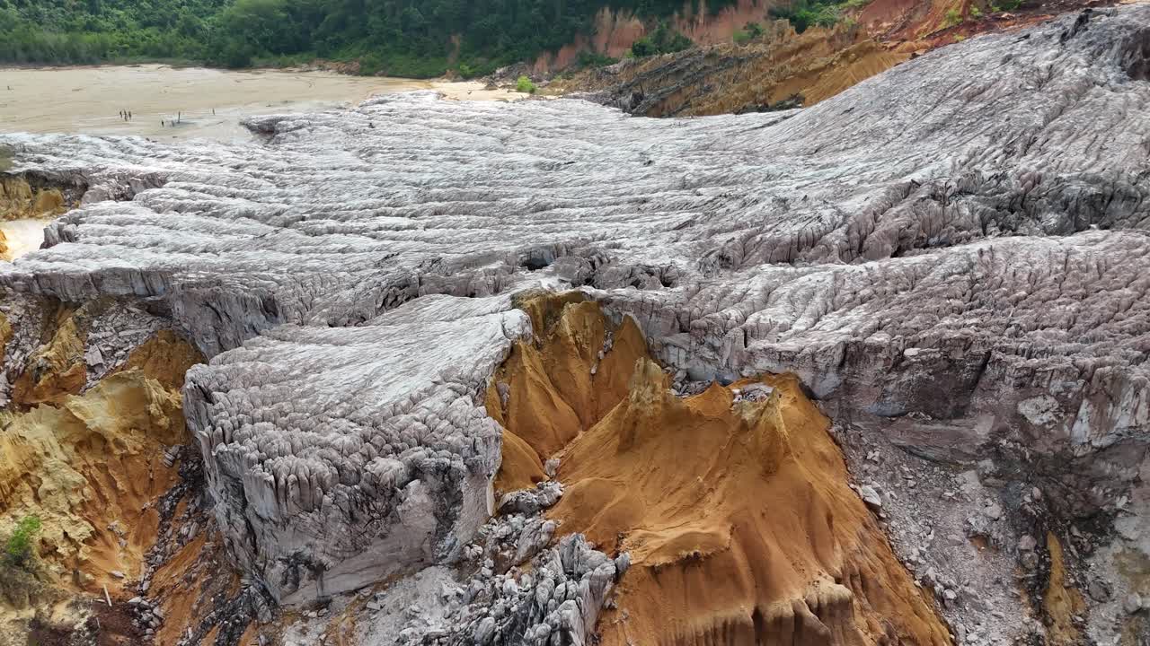 A detailed high-angle aerial perspective of the "Glacier of Salt" in the Republic of the Congo, showcasing the intricate white mineral textures