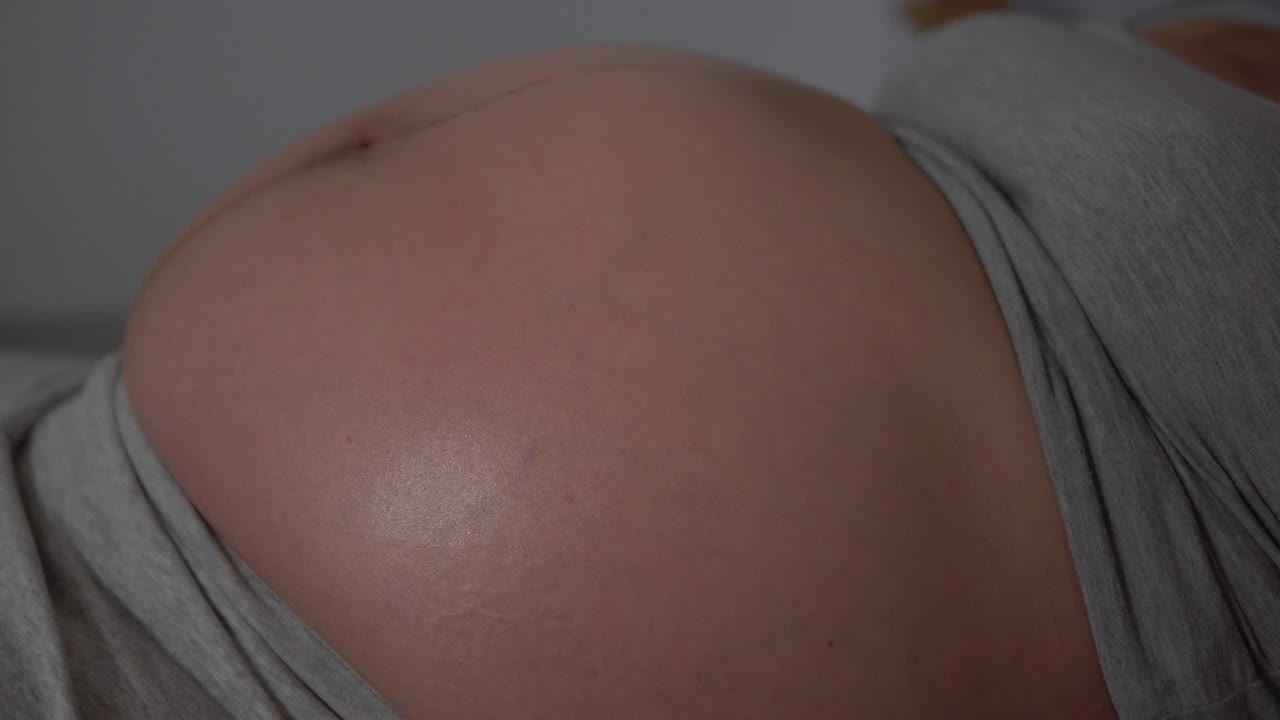 Free Porn Big Belly Pregnant - Pregnant Woman Belly Close-up When She Is Slowly Breathing Free Stock Video  Footage Download Clips