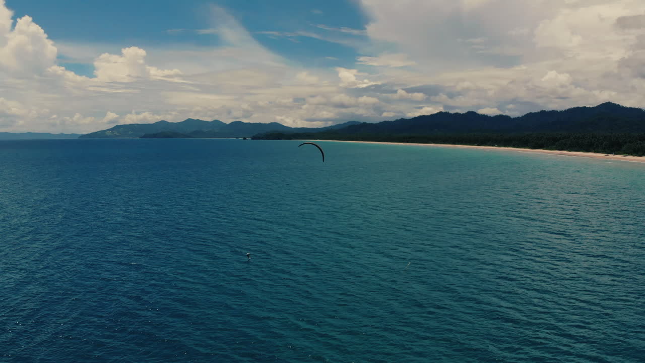 Tropical Beach Kiteboarding Scene