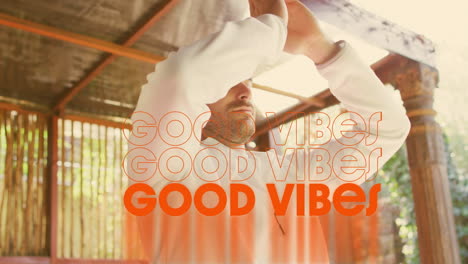 animation of good vibes text over caucasian man meditating