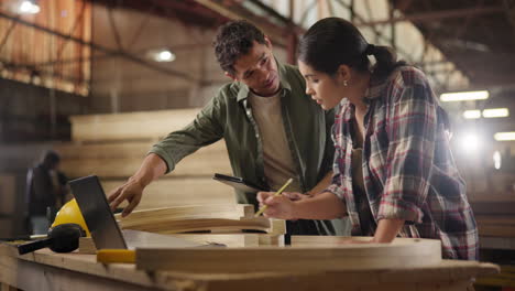 woodworking team collaborating in a workshop