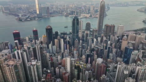 an aerial view of a large city and a body of water