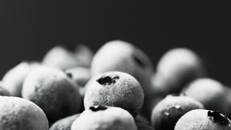 Micro-video-of-blueberries-with-copy-space-on-black-background