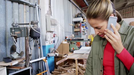 attractive carpenter phoning