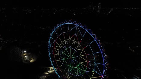 Aerial-night-panorama:-Vibrant-Ferris-wheel-at-Aztlan,-Parque-Urbano,-Chapultepec