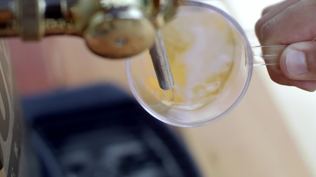 Time to relax as drinks are poured for customers. Booze available. Slow motion