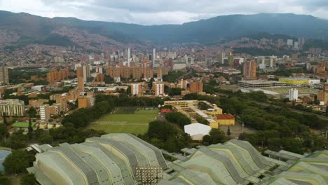 gradual dolly in towards downtown medellin, colombia on cloudy day