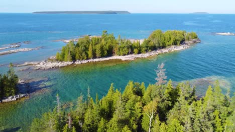 Aerial-view-of-a-small-island-situated-in-the-ocean