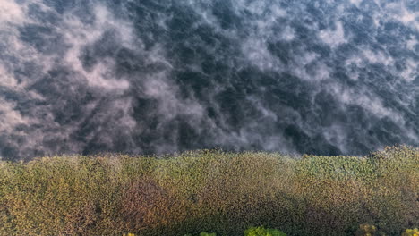 misty lake sunrise aerial view