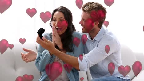 man proposing to a woman inside home