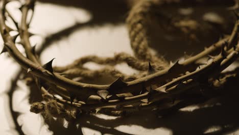 Religious-Concept-Shot-With-Close-Up-Of-Person-Throwing-Down-Crown-Of-Thorns