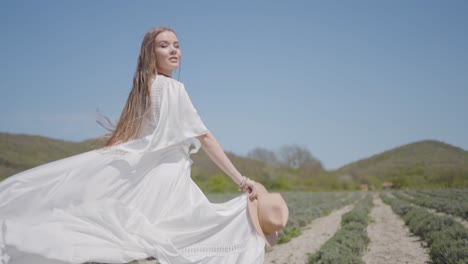 woman in white dress in lavender field