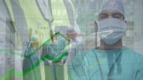 Statistical-data-processing-over-portrait-of-african-american-male-surgeon-standing-at-hospital