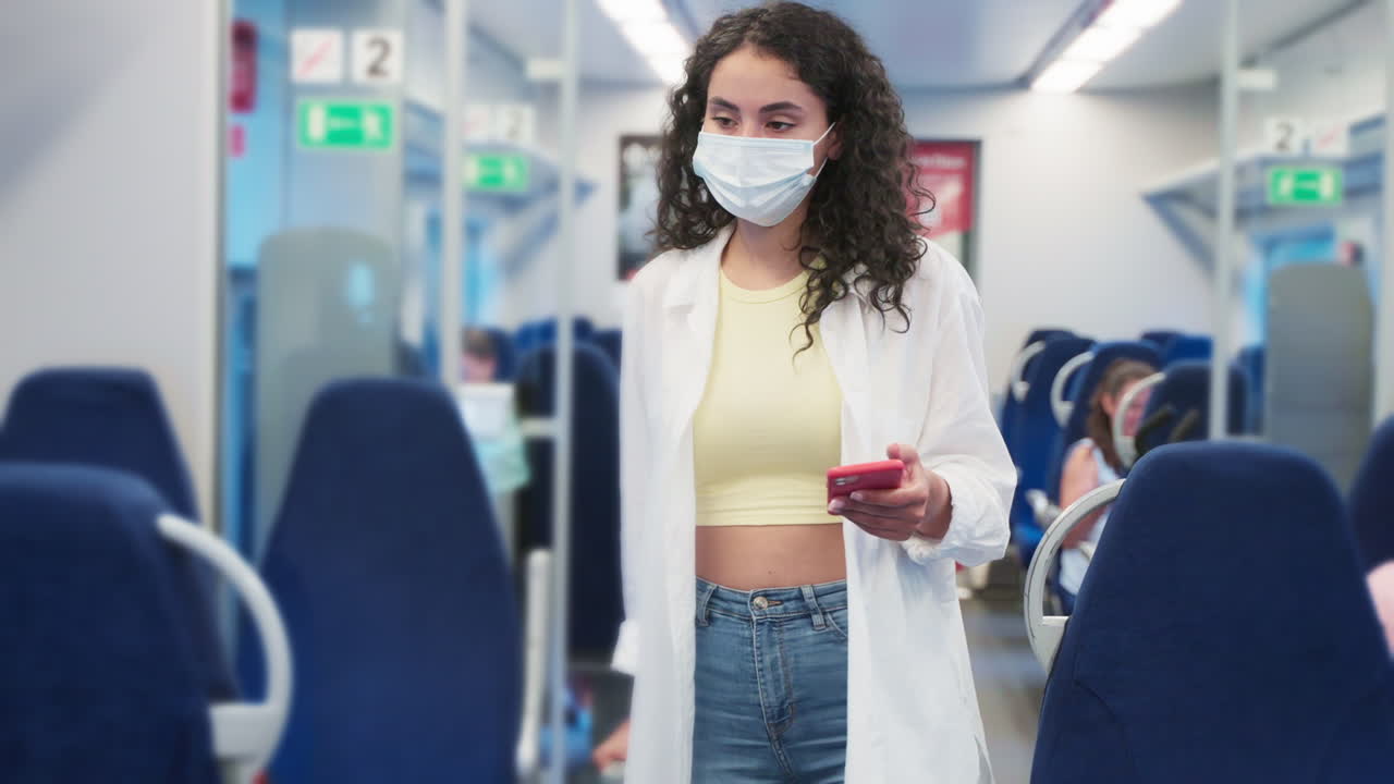 Woman Traveling by Train During Pandemic