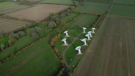 aerial view orbiting mrao mullard radio observatory telescope cluster on cambridge farmland countryside