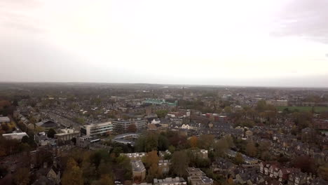 Cambridge-Centre,-drone,-look-from-sky,-foggy,-campus